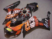 Cargar imagen en el visor de la galería, Matte Black and Orange  Rossi - CBR1000RR 06-07 Fairing Kit