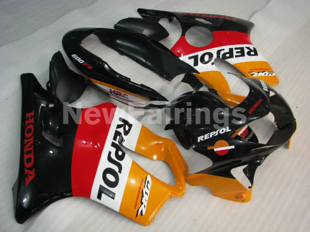 Red and Orange Black Repsol - CBR600 F4 99-00 Fairing Kit